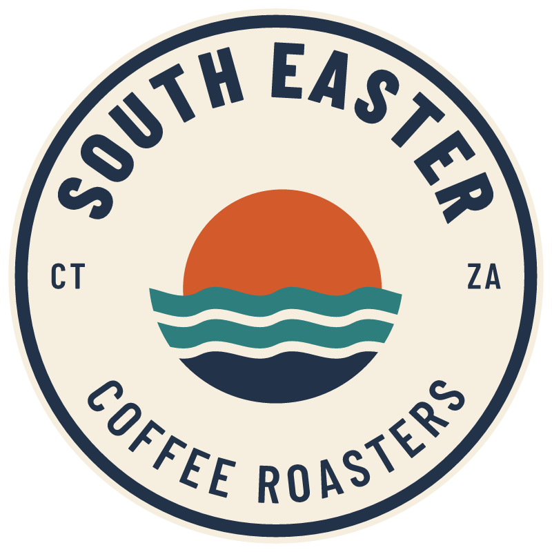South Easter Coffee Roasters badge: sun setting over Atlantic waves